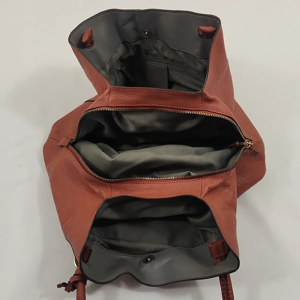 Vince Camuto Brown Orange Leather Hobo Bag.